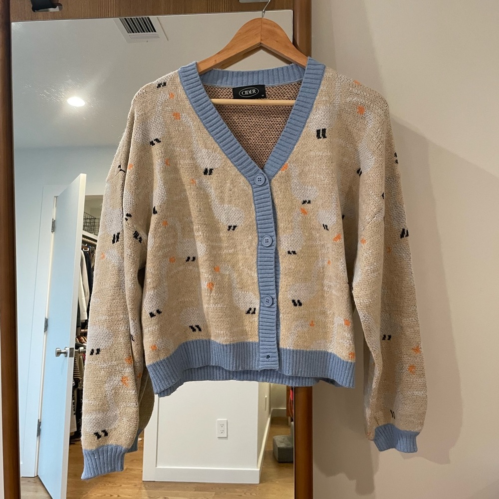 Duck pattern cardigan size Medium